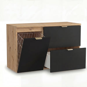 Waschtischunterschrank Orio 100 cm in Schwarz/Eiche Artisan – wandhängender Unterschrank mit integriertem Wäschekorb, Soft-Close-System, obere Schublade mit Siphonausschnitt, glatte Fronten, Metallgriffe in gebürstetem Gold, ideal für stilvolle und funktionale Badezimmer.