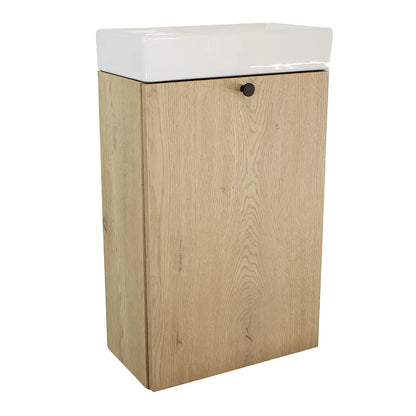 Waschtischunterschrank 40 cm mit glatter Front in Eiche Cremona, runder Metallgriff und Keramikwaschbecken für kleines Bad.