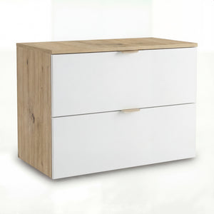 Waschtischunterschrank Orio 80 cm mit glatten, weißen Fronten, goldfarbenen Metallgriffen und passender Arbeitsplatte im Dekor Eiche Artisan, zwei geräumige Schubladen, modernes minimalistisches Design, wandhängend montiert, stilvolle Badezimmermöbel.
